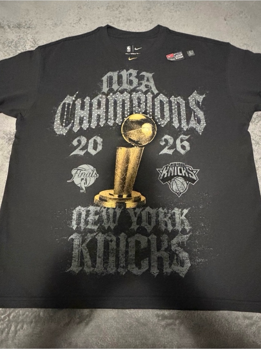 Nike Black NBA Champions New York Knicks Graphic Tee with Gold Trophy